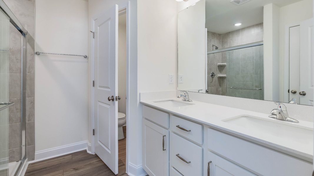 Furnished interior view inside a new home in Battle Bridge, Raleigh (Image 10).