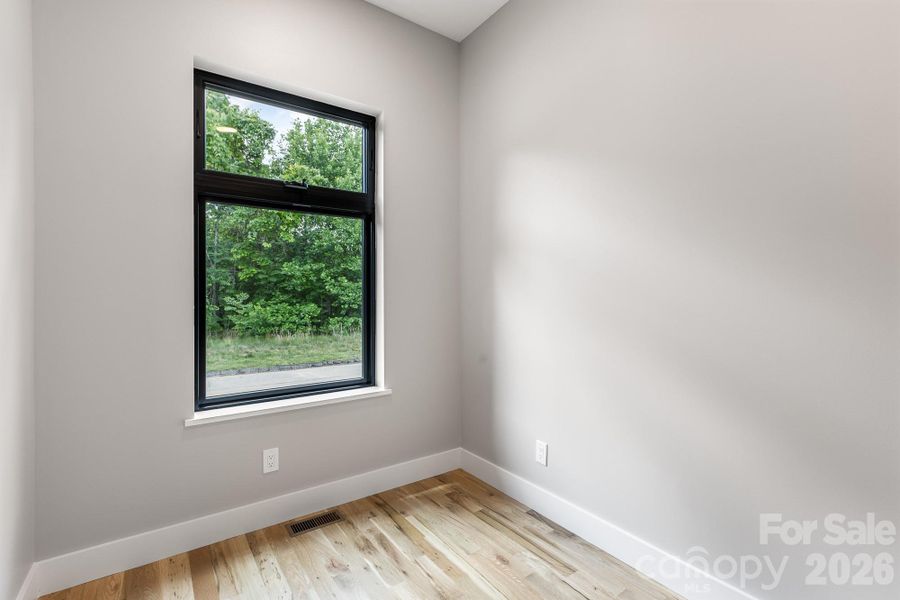 Spacious, unfurnished interior of a new home in , Waynesville (Image 33).