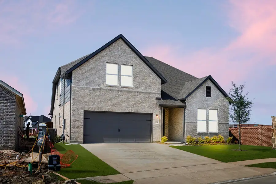 Representative exterior photo of a completed home built from the Honor by Rockwell Homes in Creekside, Royse City, TX (Image 30).