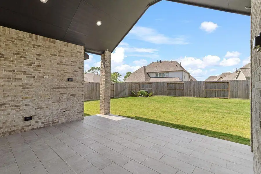 Exterior details and patio area of a home in Riceland, Mont Belvieu (Image 3).