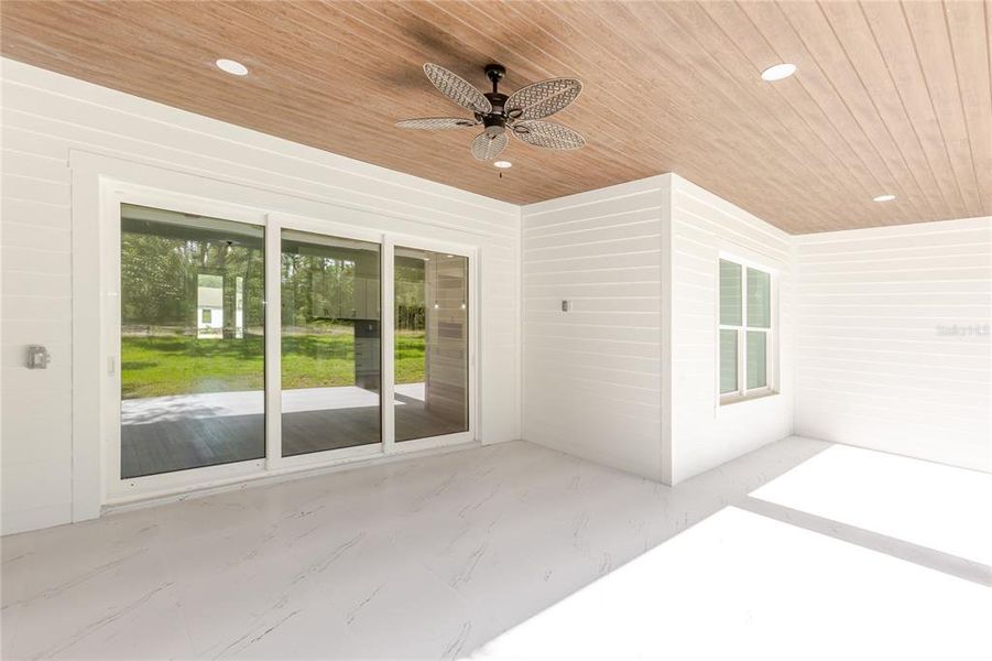 Exterior details and patio area of a home in , Weeki Wachee (Image 40).