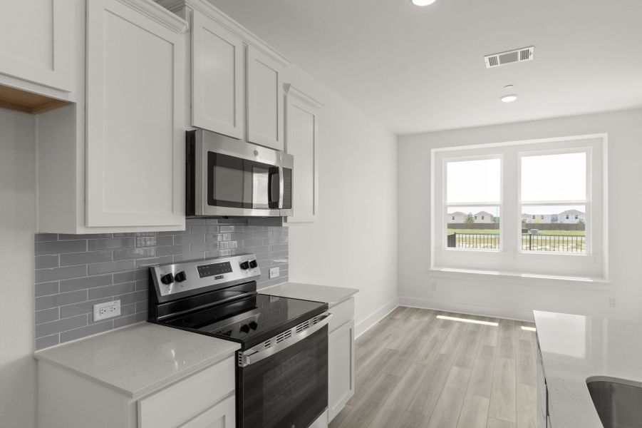 Furnished interior view inside a new home in Avery Centre, Round Rock (Image 10).