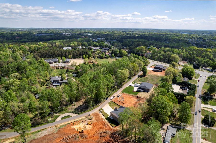 Aerial View of Property and Neighborhood