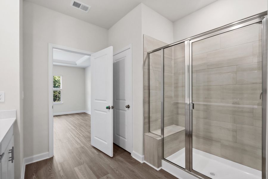 Furnished interior view inside a new home in Cypress Ridge - The Coastline Series, Longs (Image 11).