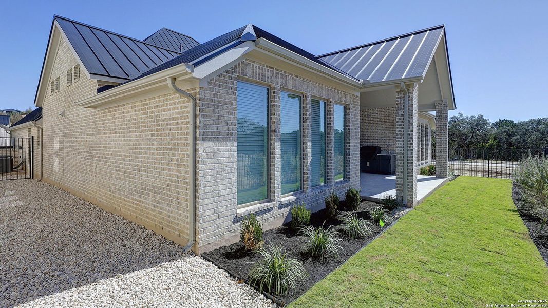 Exterior details and patio area of a home in The Dominion 70', San Antonio (Image 15). Exterior details and patio area of a home in The Dominion 70', San Antonio (Image 15).