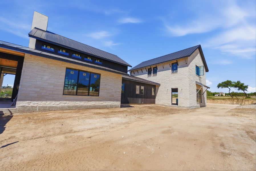 Exterior details and patio area of a home in , Dripping Springs (Image 3).