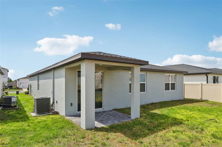 Exterior details and patio area of a home in Crosswinds - Signature Series, Haines City (Image 21).