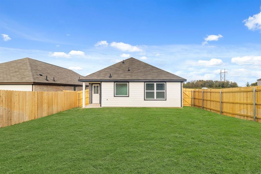 Exterior details and patio area of a home in Christian Meadows, Ennis (Image 3). Exterior details and patio area of a home in Christian Meadows, Ennis (Image 3).