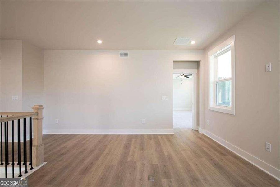 Spacious, unfurnished interior of a new home in The Paddocks at Doc Hughes, Buford (Image 25).