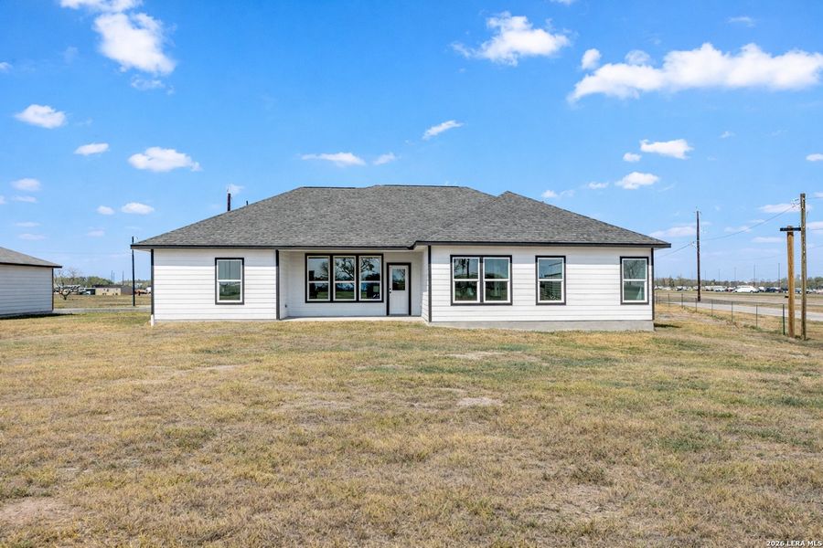 Exterior details and patio area of a home in , Atascosa (Image 22).