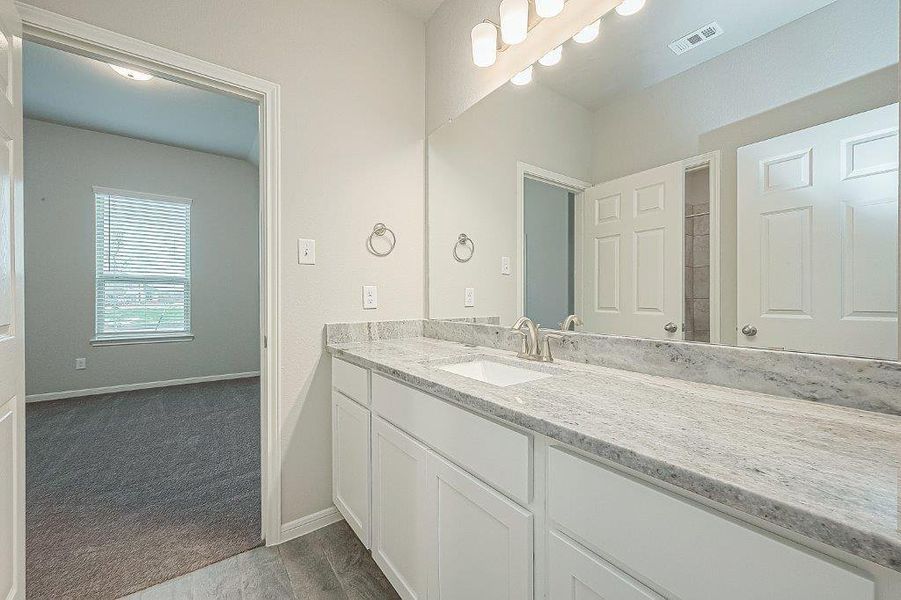 Furnished interior view inside a new home in Grand Magnolia, Magnolia (Image 14).
