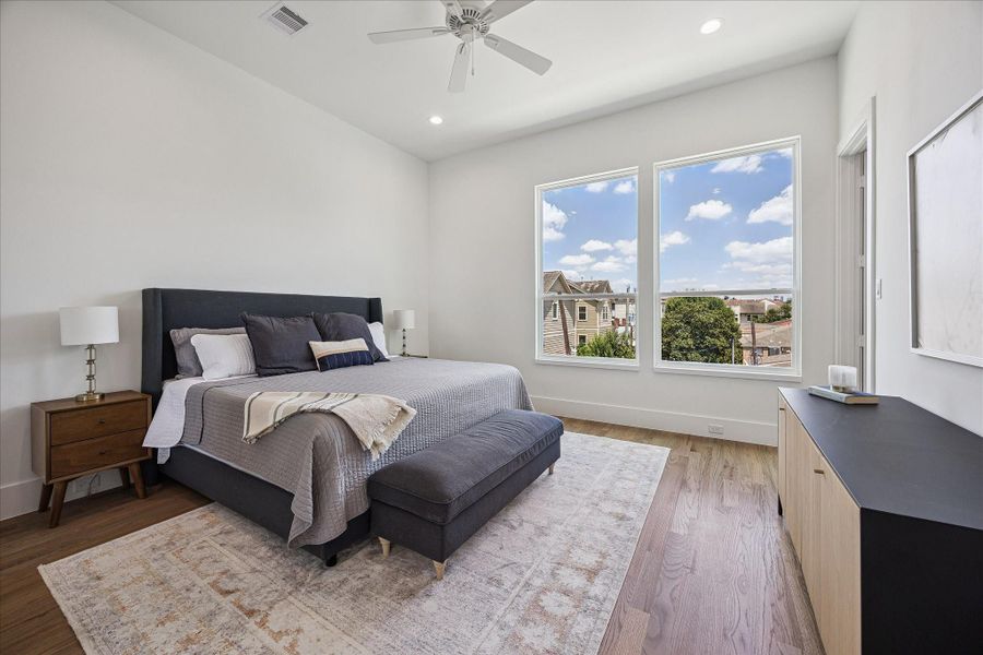 Relaxing owner's retreat with oversized windows and room to unwind.