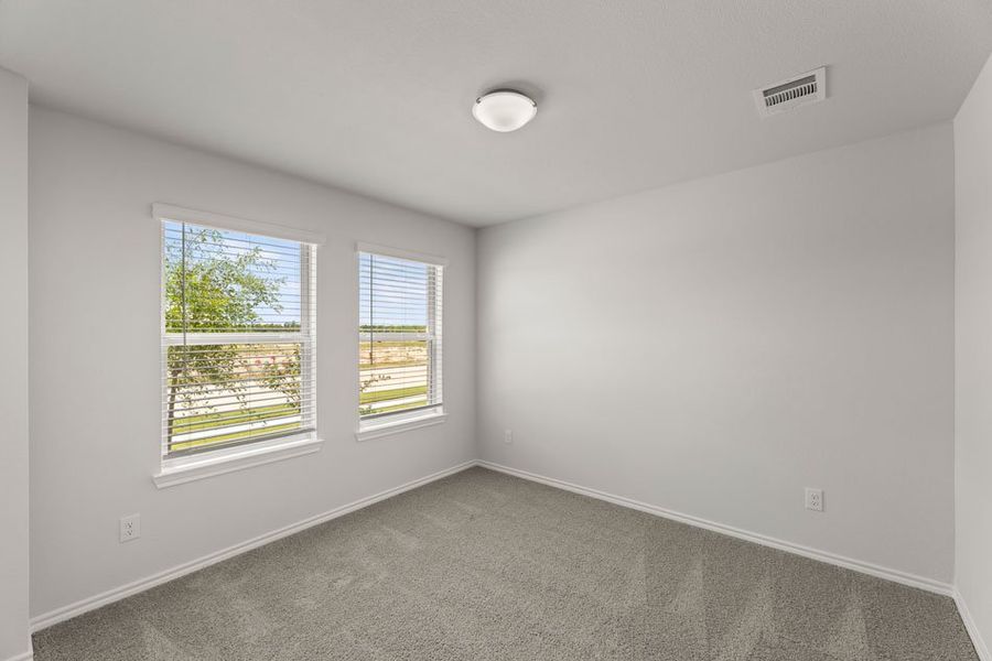 Front exterior of a new home in Northspur, Terrell, TX, highlighting curb appeal (Image 22). Front exterior of a new home in Northspur, Terrell, TX, highlighting curb appeal (Image 22).