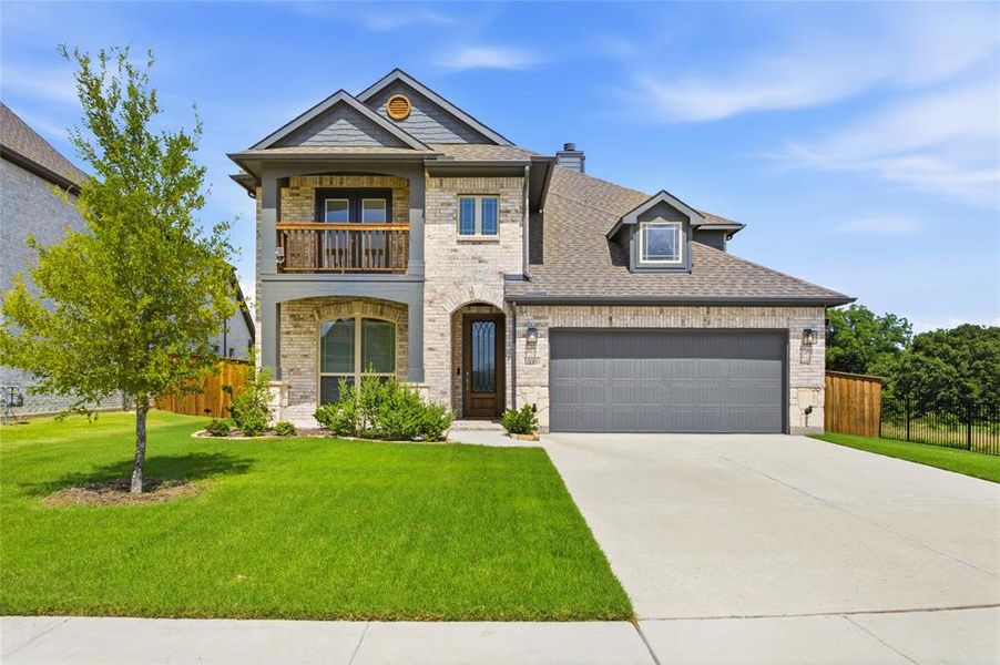 Front exterior of a new home in , Providence Village, TX, highlighting curb appeal (Image 1). Front exterior of a new home in , Providence Village, TX, highlighting curb appeal (Image 1).