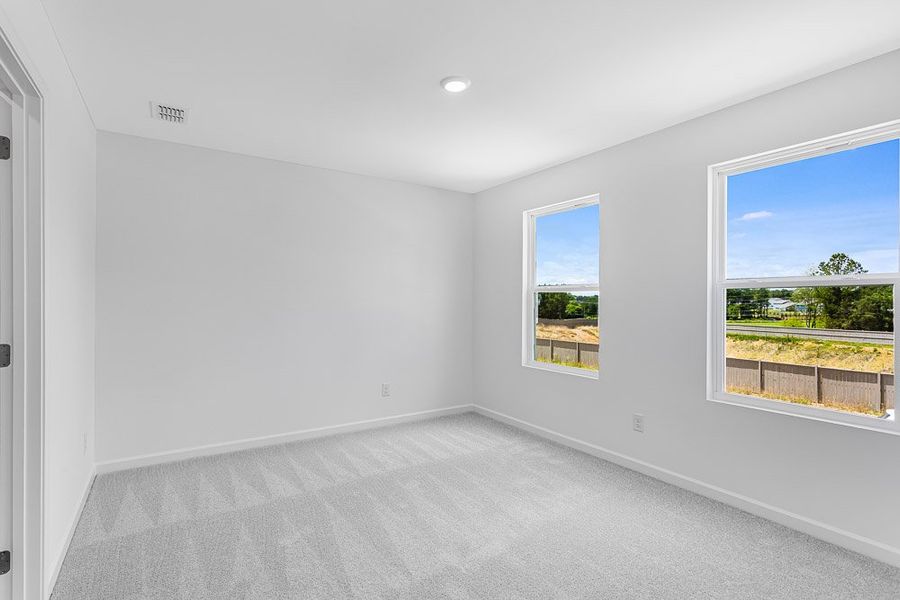 Representative unfurnished interior of a home built from the Avera by Taylor Morrison in Windance Lake, Loganville (Image 28).