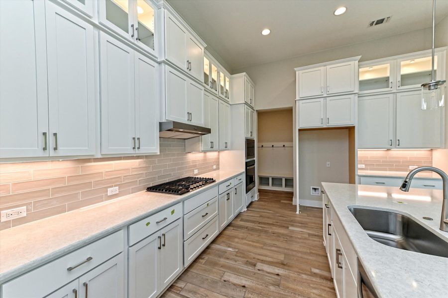 Representative furnished interior of a home built from the Opal by Giddens Homes in Riverstone, Georgetown (Image 7).