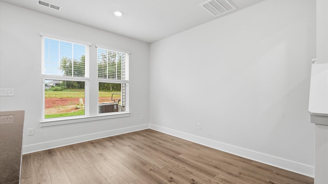 Inviting breakfast area with a seamless connection to the kitchen for everyday living by DRB Homes
