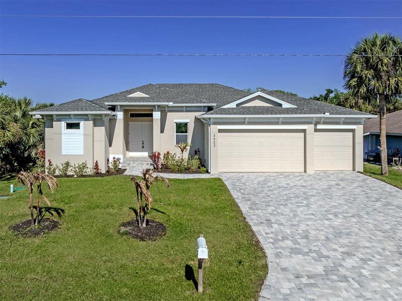 Front exterior of a new home in , Port Charlotte, FL, highlighting curb appeal (Image 21).