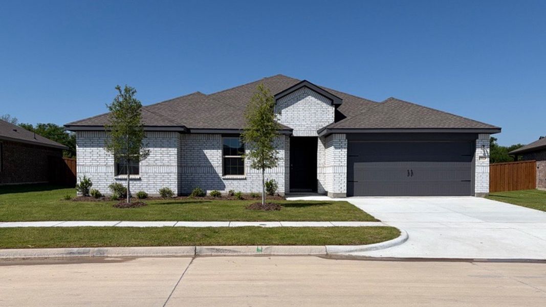 Front exterior of a new home in Northspur, Terrell, TX, highlighting curb appeal (Image 2). Front exterior of a new home in Northspur, Terrell, TX, highlighting curb appeal (Image 2).