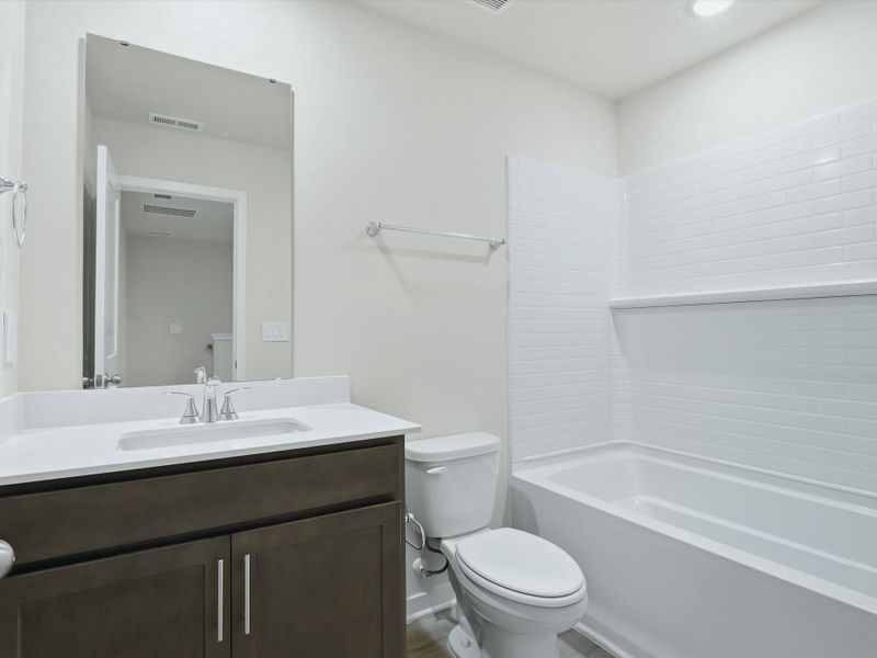 Furnished interior view inside a new home in Oakwood Townes, Mebane (Image 7).