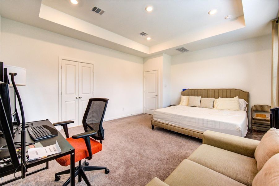 The primary bedroom serves as a serene retreat—an ideal place to relax and unwind. Thoughtfully designed with a spacious layout and calming ambiance, it provides a private haven for rest and comfort, making it the perfect place to recharge at the end of each day.