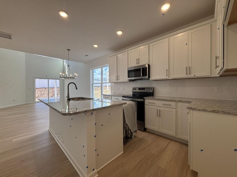Furnished interior view inside a new home in CraigStone, Woodruff (Image 5). Furnished interior view inside a new home in CraigStone, Woodruff (Image 5).