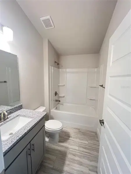 Furnished interior view inside a new home in Abbey Glen, Dade City (Image 6).