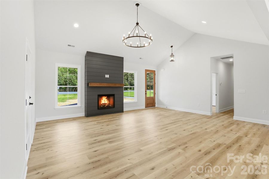 vaulted living room- shiplap fireplace w/ cedar mantle vaulted living room- shiplap fireplace w/ cedar mantle