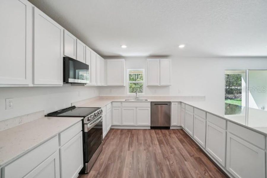 Furnished interior view inside a new home in Royal Highlands, Weeki Wachee (Image 5).