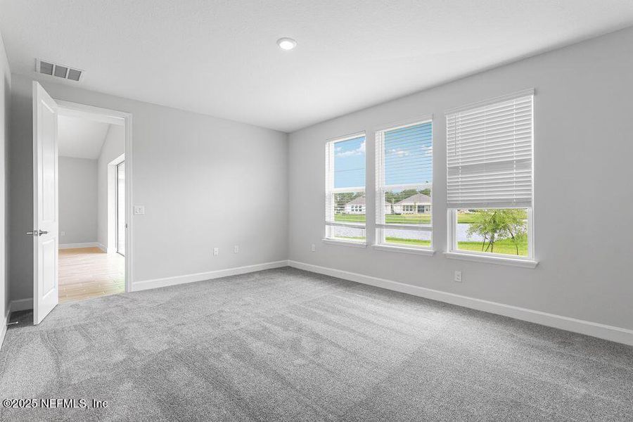 Spacious, unfurnished interior of a new home in Colbert Landings, Palm Coast (Image 22).