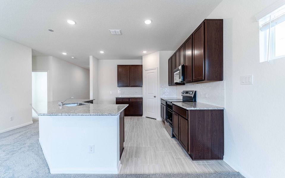 Furnished interior view inside a new home in Hannah Heights, Seguin (Image 4).