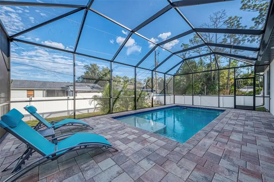 Exterior details and patio area of a home in , North Port (Image 3).