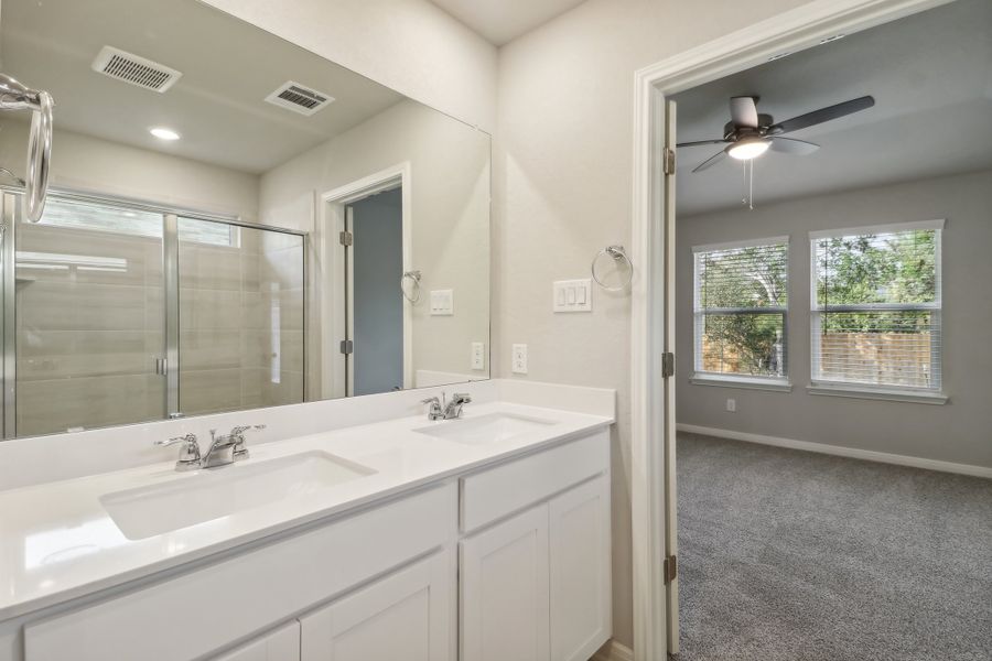 Primary suite bathroom in the Cascade floorplan at a Meritage Homes community.