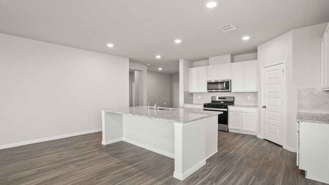 Furnished interior view inside a new home in Hunters Ranch, San Antonio (Image 6).