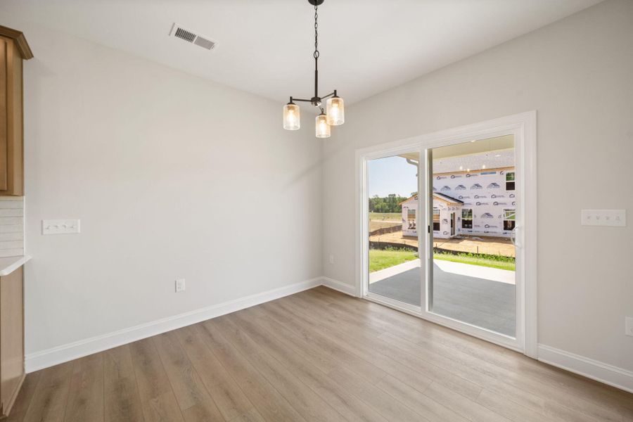 Spacious, unfurnished interior of a new home in Hayes Village, Greensboro (Image 21).