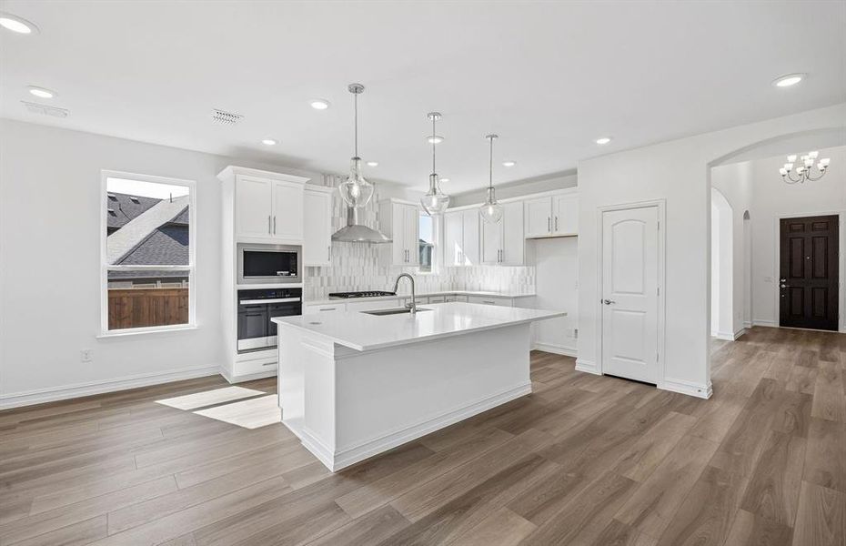 Large island overlooking gathering room