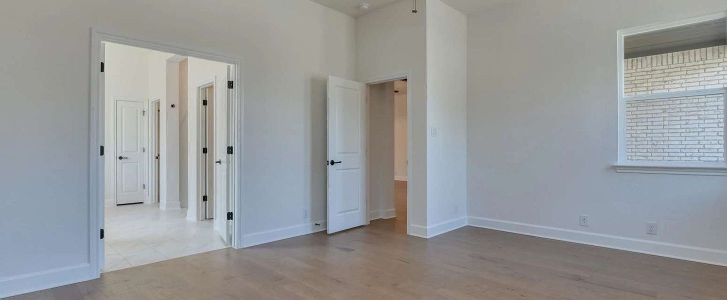 Representative unfurnished interior of a home built from the Alexander II by Ashton Woods in Sunday Creek at Kinder Ranch, San Antonio (Image 24).