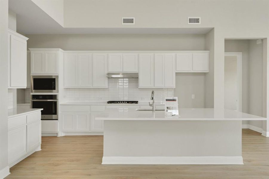 Furnished interior view inside a new home in Highland Crossing, Celina (Image 10).