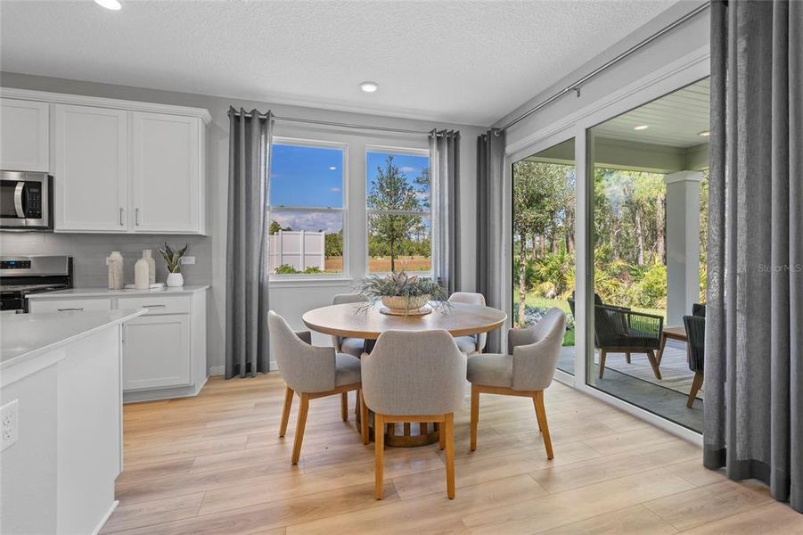 Furnished interior view inside a new home in Reserve East, Flagler Beach (Image 8).