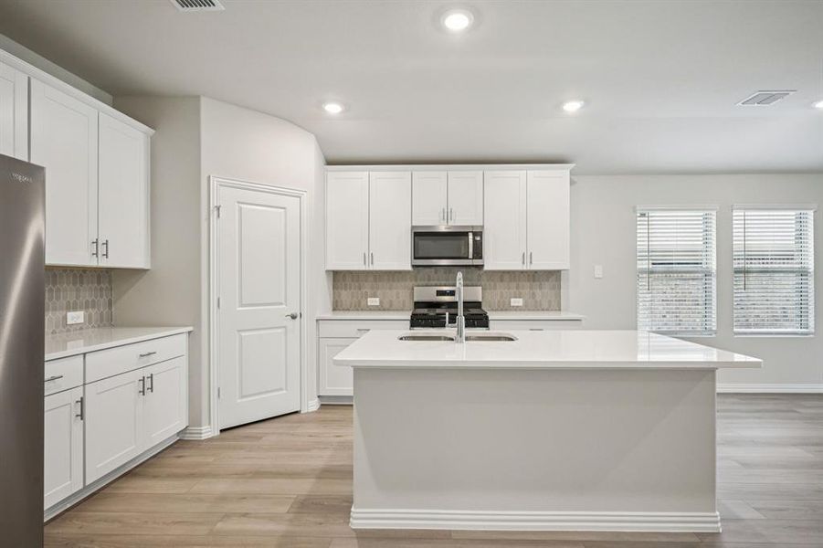 Furnished interior view inside a new home in Westmoor, Sherman (Image 12).