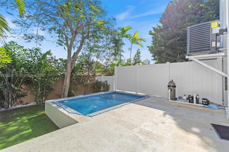 Exterior details and patio area of a home in , Miami (Image 3).