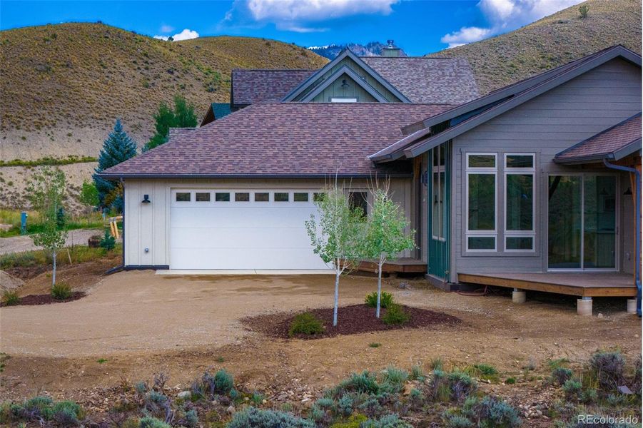 Front exterior of a new home in , Hot Sulphur Springs, CO, highlighting curb appeal (Image 14).