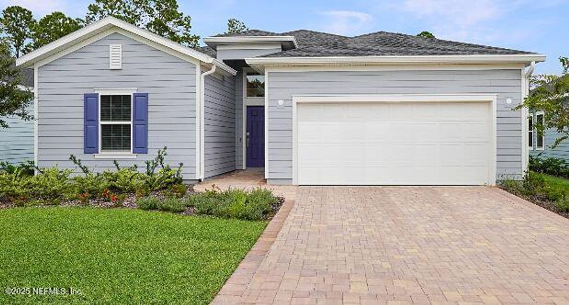 Front exterior of a new home in Silver Meadows at SilverLeaf: Silver Meadows 50s, St. Augustine, FL, highlighting curb appeal (Image 1).