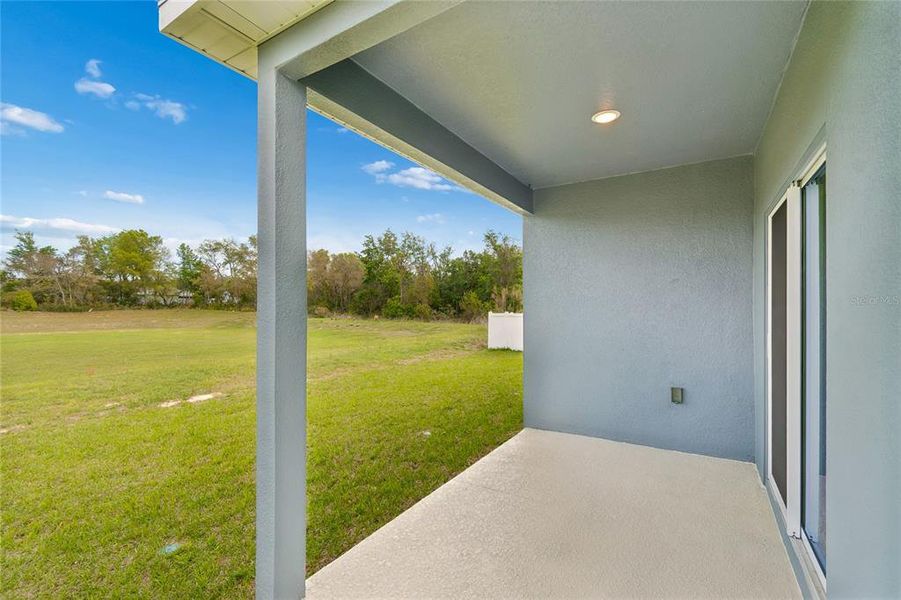 Exterior details and patio area of a home in Aspire at Glen Aire, Ocala (Image 3).