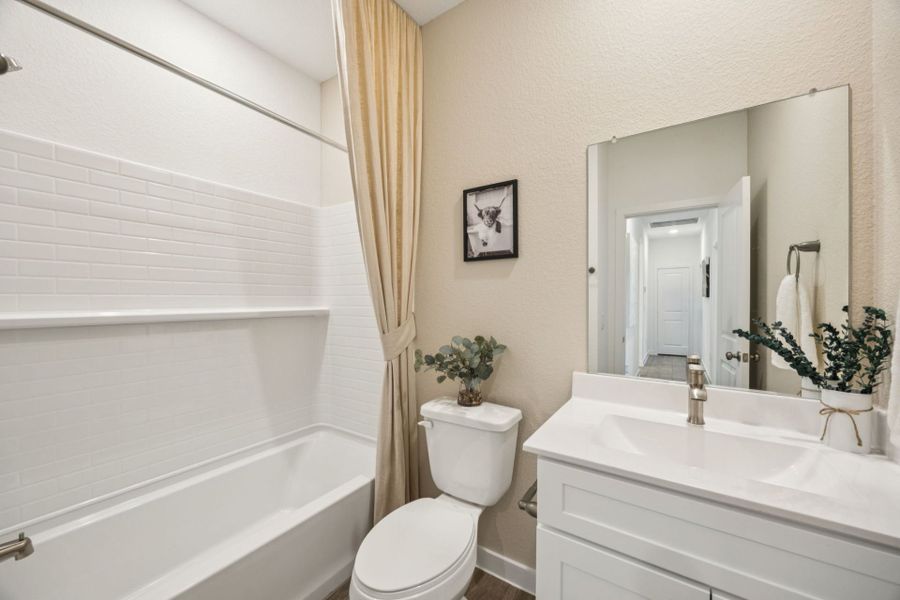 Representative furnished interior of a home built from the Lufkin by Pulte Homes in Wolf Ranch, Georgetown (Image 11).