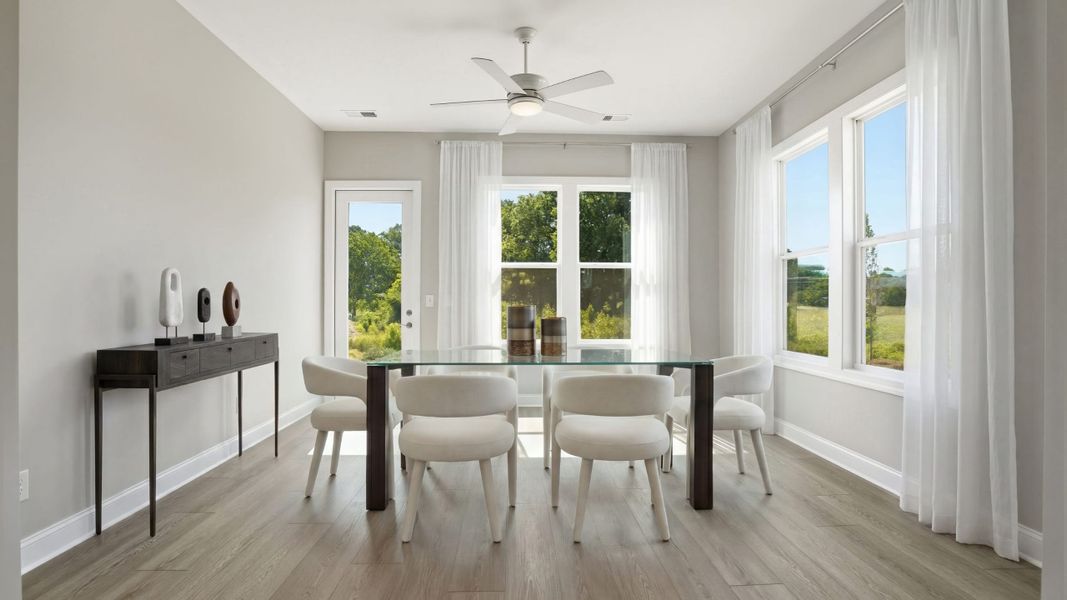 Furnished interior view inside a new home in Cresswind at Rocky River, Locust (Image 13).