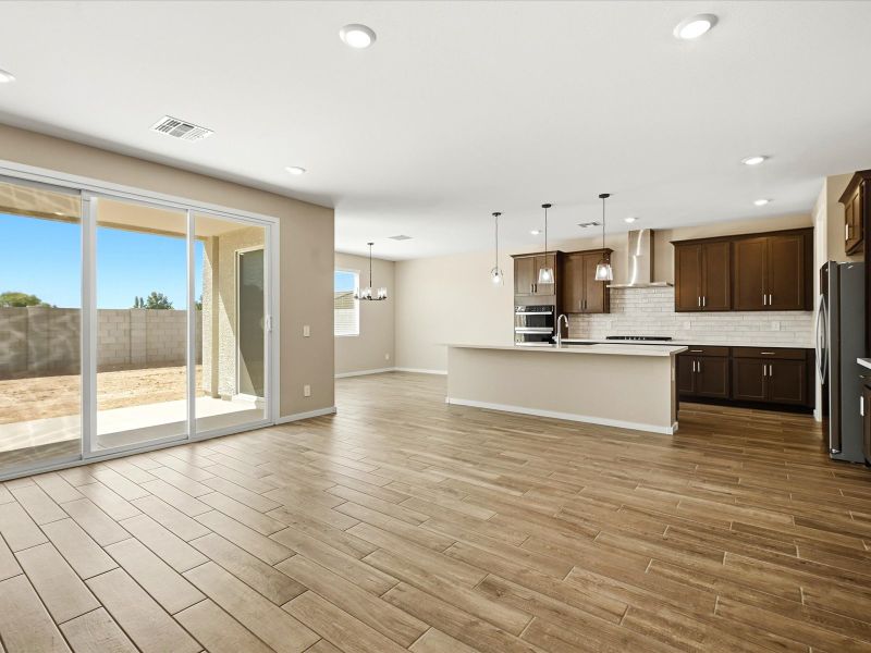 Spacious, unfurnished interior of a new home in White Tank Foothills Signature Series, Waddell (Image 9).