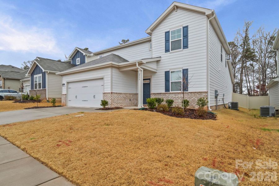 Front exterior of a new home in Blue Sky Meadows, Monroe, NC, highlighting curb appeal (Image 24).