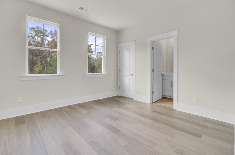 Spacious, unfurnished interior of a new home in Indigo Grove Single Family Homes, Johns Island (Image 37).