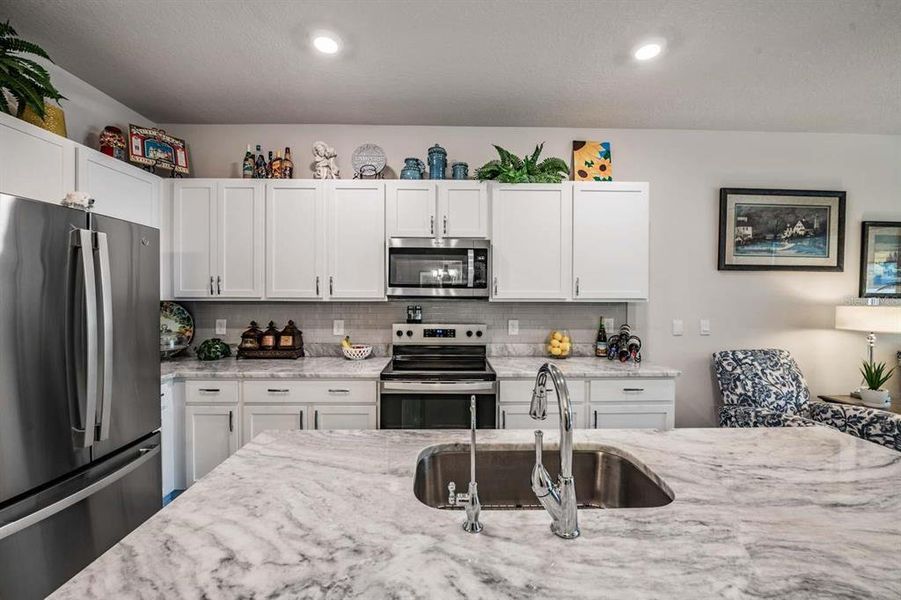 Furnished interior view inside a new home in Azalea Shores, Largo (Image 18).